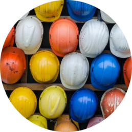 various colored hard hats